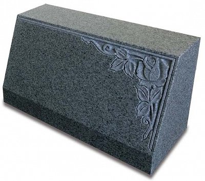 An upright Karin Grey granite tablet memorial with deep carved rose design.