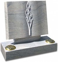 Shaped to resemble a paperback book and featuring raised carved calla lilies. This modern take on a traditional memorial is shown in polished Imperial White granite.