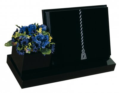 A Black granite book memorial with a side vase.