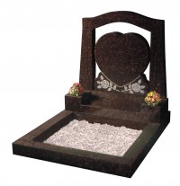A Cats Eye granite memorial with a heart and rose decoration.