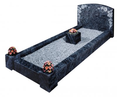 A Bahama Blue granite kerb set memorial with a rose design.