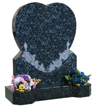 A Blue Pearl heart memorial with carved rose detail.